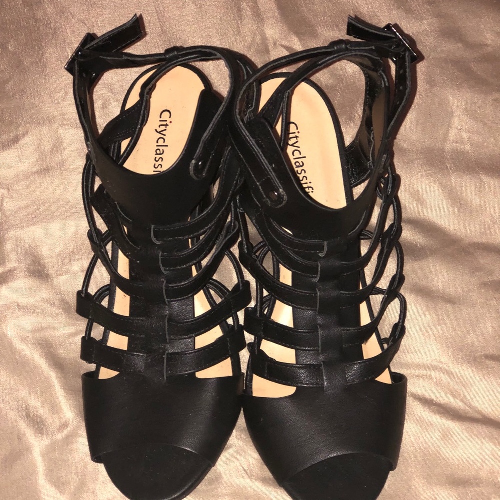 Strapped black heels
